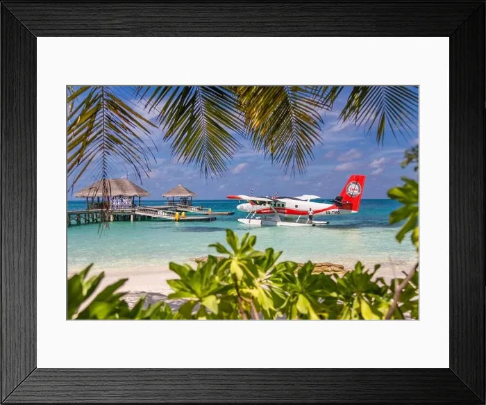 Framed Print : Ari Atoll, Maldives - 05.05.2018: Maldives seaplane on luxury resort, wooden jetty loading the plane, ready for departure. Tropical island background Framed Print : Ari Atoll, Maldives - 05.05.2018: Maldives seaplane on luxury resort, wooden jetty loading the plane, ready for departure. Tropical island background