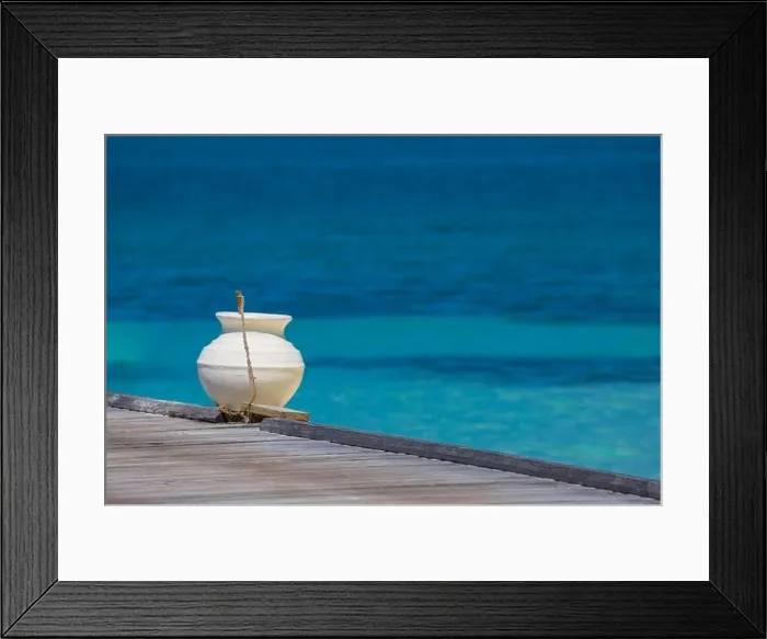 Framed Print : Wooden jetty towards a small island on Indian Ocean, Maldives. Sunny blue sky Framed Print : Wooden jetty towards a small island on Indian Ocean, Maldives. Sunny blue sky