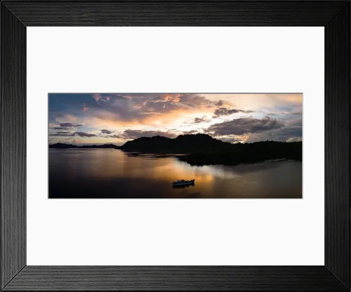 Framed Print : The last light of day illuminates clouds drifting above remote islands in the Solomon Islands. This country is home to high marine biodiversity Framed Print : The last light of day illuminates clouds drifting above remote islands in the Solomon Islands. This country is home to high marine biodiversity