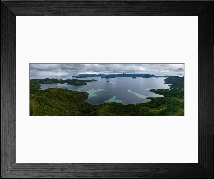 Framed Print : A scenic tropical island is fringed by a healthy coral reef in the Solomon Islands. This beautiful country is home to spectacular marine biodiversity Framed Print : A scenic tropical island is fringed by a healthy coral reef in the Solomon Islands. This beautiful country is home to spectacular marine biodiversity