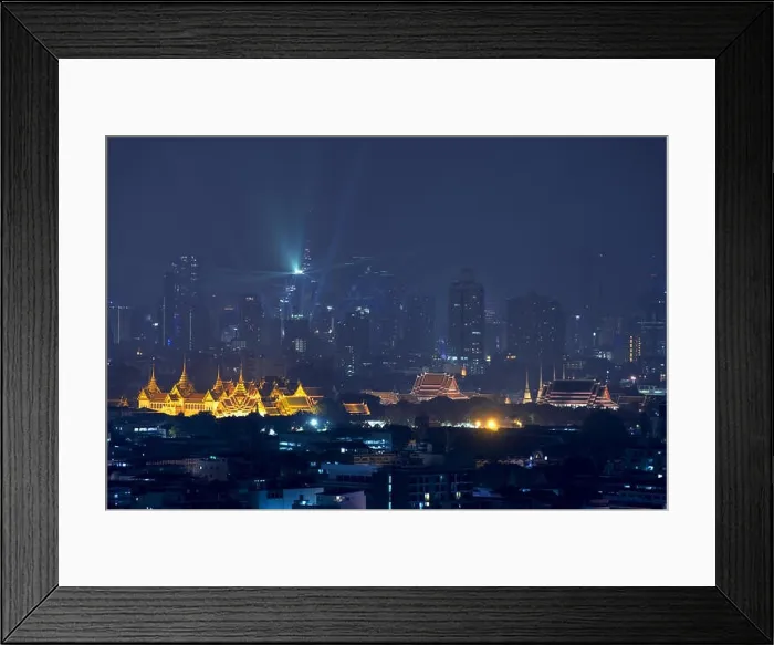 Framed Print : Grand palace with Bangkok city skyscrapers at night in Bangkok, Thailand Framed Print : Grand palace with Bangkok city skyscrapers at night in Bangkok, Thailand