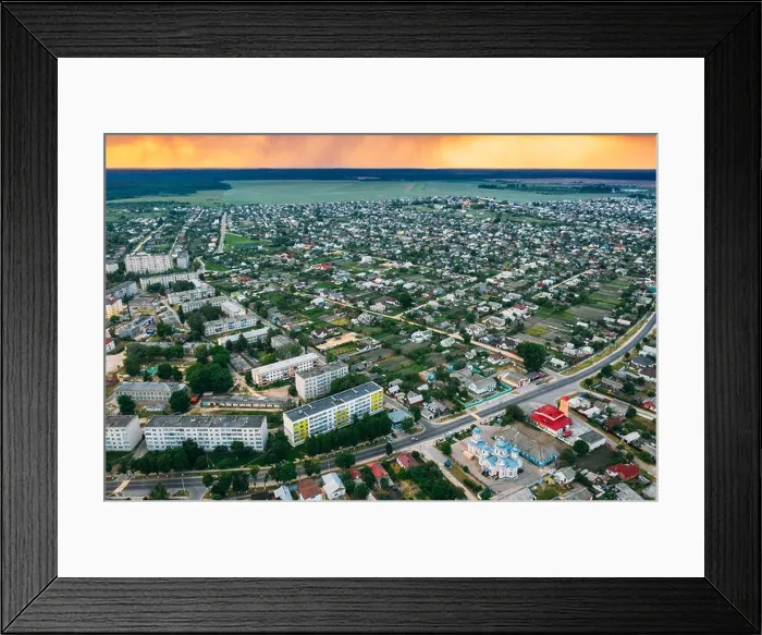 Framed Print : Dobrush, Gomel Region, Belarus. Aerial View Of Dobrush Cityscape Skyline In Spring Sunset Sunrise Time. Residential District And River In Bird's-eye V Framed Print : Dobrush, Gomel Region, Belarus. Aerial View Of Dobrush Cityscape Skyline In Spring Sunset Sunrise Time. Residential District And River In Bird's-eye V