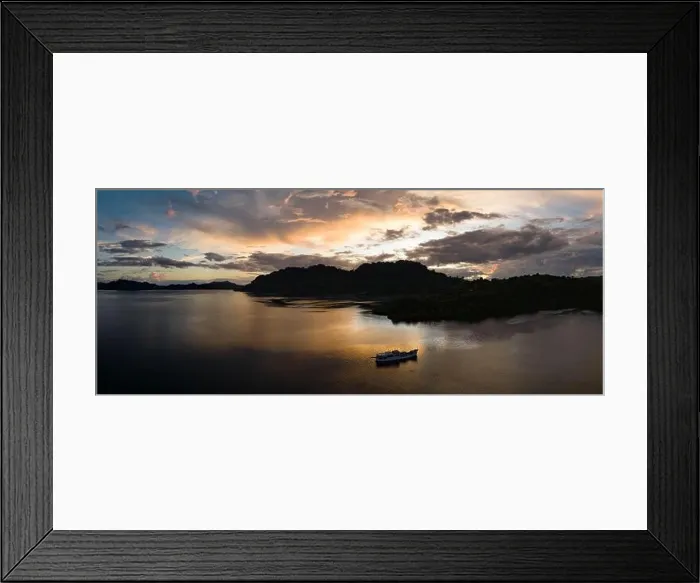 Framed Print : The last light of day illuminates clouds drifting above remote islands in the Solomon Islands. This country is home to high marine biodiversity Framed Print : The last light of day illuminates clouds drifting above remote islands in the Solomon Islands. This country is home to high marine biodiversity