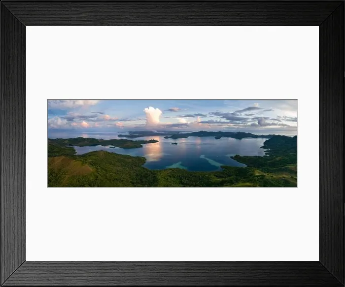 Framed Print : The last light of day illuminates clouds drifting above remote islands in the Solomon Islands. This country is home to high marine biodiversity Framed Print : The last light of day illuminates clouds drifting above remote islands in the Solomon Islands. This country is home to high marine biodiversity