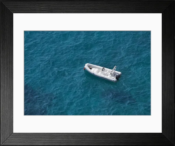 Framed Print : Aerial view of a white speed boat on a blue clear sea water Framed Print : Aerial view of a white speed boat on a blue clear sea water