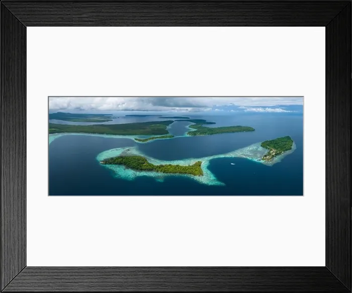 Framed Print : A healthy, robust coral reef surrounds a scenic bay in the Solomon Islands. This beautiful country is home to spectacular marine biodiversity Framed Print : A healthy, robust coral reef surrounds a scenic bay in the Solomon Islands. This beautiful country is home to spectacular marine biodiversity