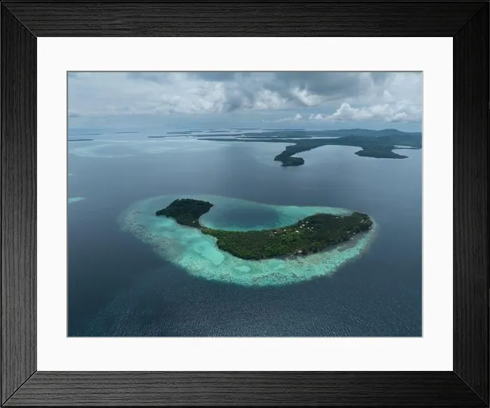 Framed Print : Lush, tropical islands are fringed by robust coral reefs in the Solomon Islands. This beautiful country is home to spectacular marine biodiversity Framed Print : Lush, tropical islands are fringed by robust coral reefs in the Solomon Islands. This beautiful country is home to spectacular marine biodiversity