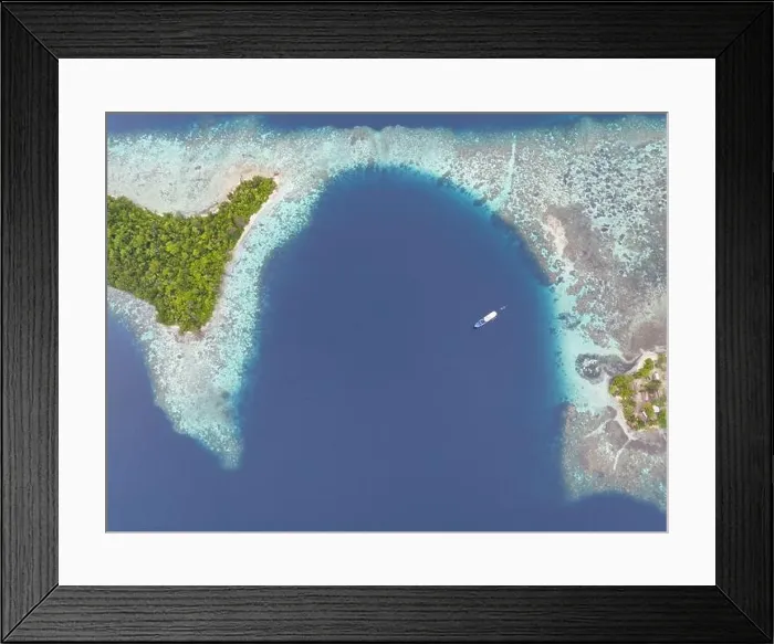 Framed Print : A healthy, robust coral reef surrounds a scenic bay in the Solomon Islands. This beautiful country is home to spectacular marine biodiversity Framed Print : A healthy, robust coral reef surrounds a scenic bay in the Solomon Islands. This beautiful country is home to spectacular marine biodiversity