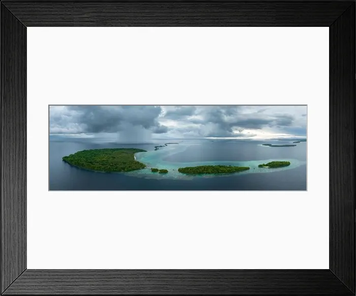 Framed Print : Storm clouds dump rain near a remote tropical island in the Solomon Islands. This beautiful country is home to spectacular marine biodiversity Framed Print : Storm clouds dump rain near a remote tropical island in the Solomon Islands. This beautiful country is home to spectacular marine biodiversity