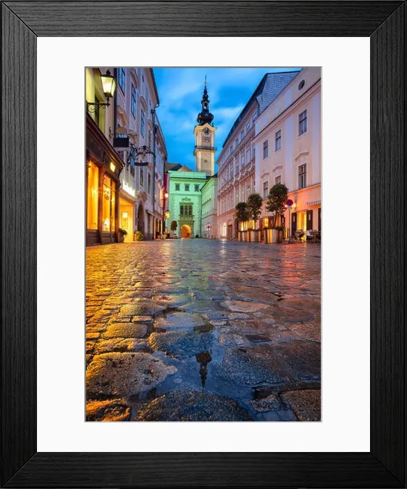 Framed Print : Linz, Austria. Cityscape image of old town Linz, Austria during twilight blue hour with reflection of the city lights Framed Print : Linz, Austria. Cityscape image of old town Linz, Austria during twilight blue hour with reflection of the city lights