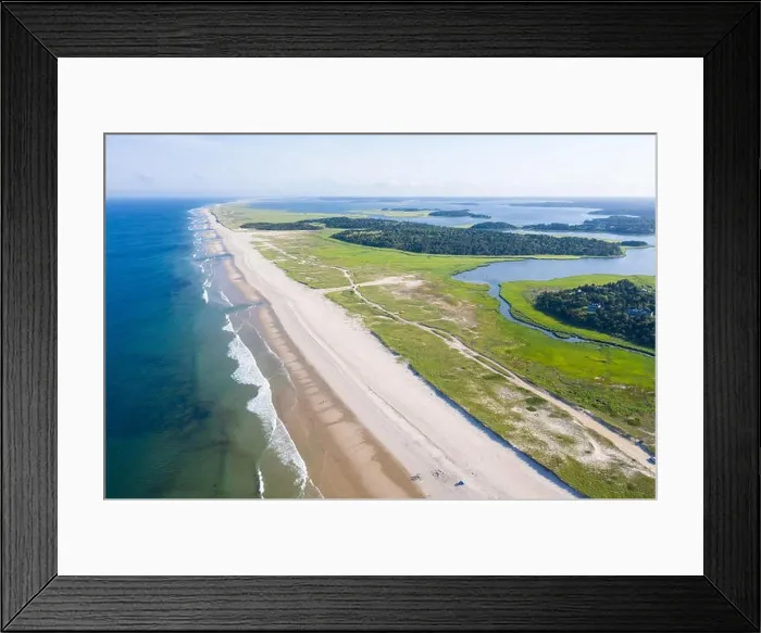 Framed Print : The cold waters of the Atlantic Ocean bathe a scenic beach on Cape Cod, Massachusetts. This beautiful part of New England is a popular vacation area