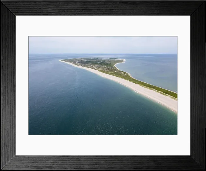 Framed Print : The cold waters of the Atlantic Ocean bathe Monomoy Island on Cape Cod, Massachusetts. This beautiful part of New England is a popular vacation area Framed Print : The cold waters of the Atlantic Ocean bathe Monomoy Island on Cape Cod, Massachusetts. This beautiful part of New England is a popular vacation area