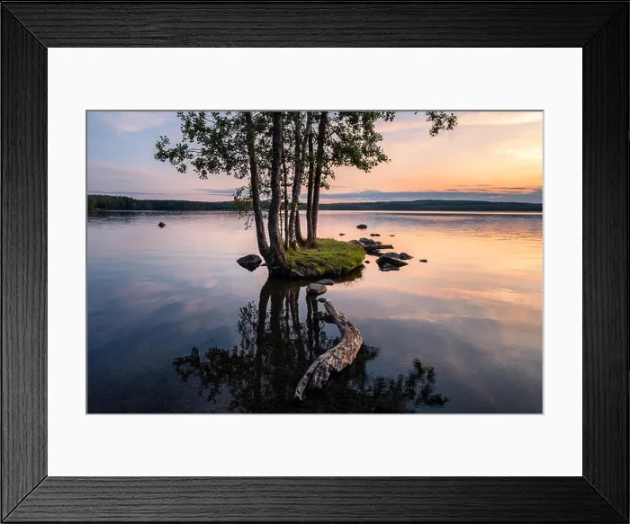 Framed Print : Idyllic smalll island with tranquil lake and beautiful sunset at summer evening in Finland Framed Print : Idyllic smalll island with tranquil lake and beautiful sunset at summer evening in Finland