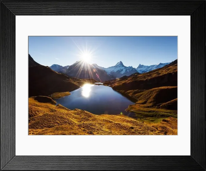 Framed Print : Picturesque view on Bachalpsee lake in Swiss Alps mountains. Snowy peaks of Wetterhorn, Mittelhorn and Rosenhorn on background Framed Print : Picturesque view on Bachalpsee lake in Swiss Alps mountains. Snowy peaks of Wetterhorn, Mittelhorn and Rosenhorn on background