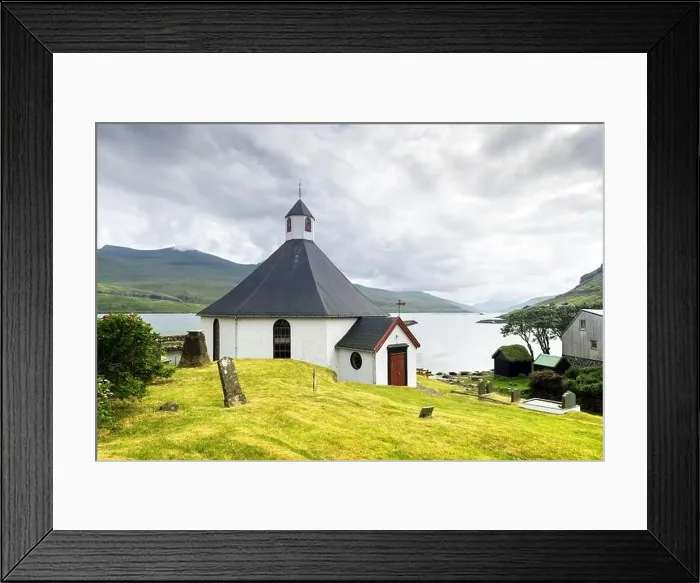Framed Print : Summer view of traditional church in faroese village. Beauty landscape with foggy fjord and high mountains. Faroe Islands, Denmark Framed Print : Summer view of traditional church in faroese village. Beauty landscape with foggy fjord and high mountains. Faroe Islands, Denmark