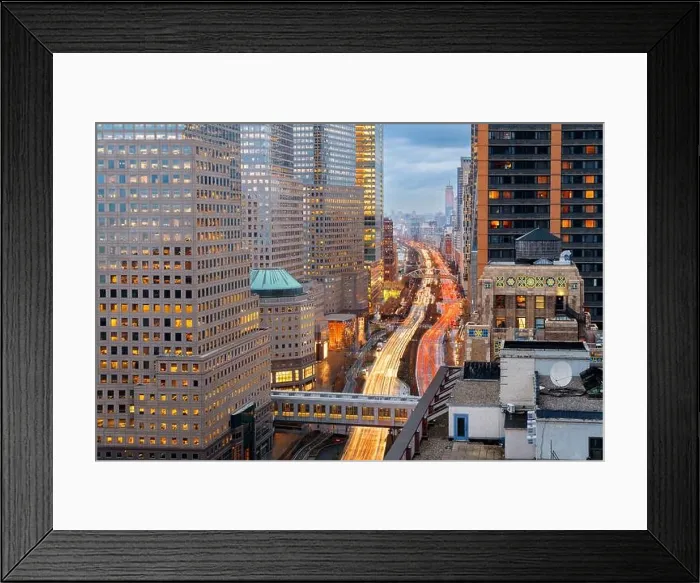 Framed Print : New York, New York, USA financial district cityscape over the West Side Highway at dusk