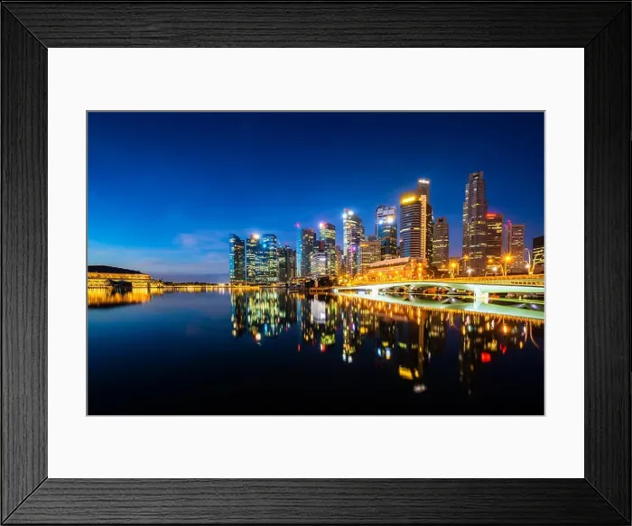 Framed Print : Singapore skyscraper building in downtown district with water reflection at Marina Bay in night, Singapore Framed Print : Singapore skyscraper building in downtown district with water reflection at Marina Bay in night, Singapore