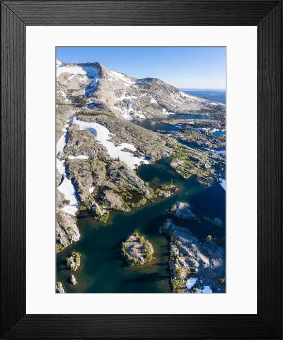Framed Print : High granite mountains surround beautiful lakes in the Desolation Wilderness, California. This mountainous area is a popular backpacking destination Framed Print : High granite mountains surround beautiful lakes in the Desolation Wilderness, California. This mountainous area is a popular backpacking destination
