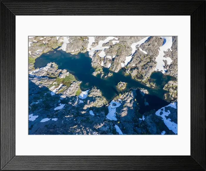 Framed Print : High granite mountains surround a beautiful lake in the Desolation Wilderness, California. This mountainous area is a popular backpacking destination Framed Print : High granite mountains surround a beautiful lake in the Desolation Wilderness, California. This mountainous area is a popular backpacking destination