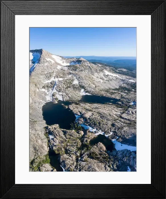Framed Print : High granite mountains surround beautiful lakes in the Desolation Wilderness, California. This mountainous area is a popular backpacking destination Framed Print : High granite mountains surround beautiful lakes in the Desolation Wilderness, California. This mountainous area is a popular backpacking destination
