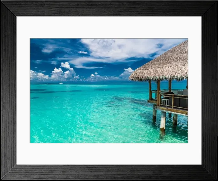 Framed Print : Over water luxurious spa in the tropical blue lagoon of Maldives. Amazing sea view and summer beach mood Framed Print : Over water luxurious spa in the tropical blue lagoon of Maldives. Amazing sea view and summer beach mood