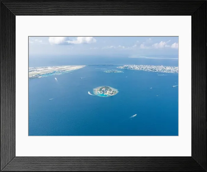 Framed Print : Maldives island capital island, Male. Hulhumale city island view from over the clouds. Aerial landscape in exotic travel destination Framed Print : Maldives island capital island, Male. Hulhumale city island view from over the clouds. Aerial landscape in exotic travel destination