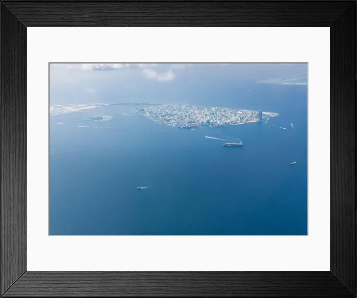 Framed Print : Maldives island capital island, Male. Hulhumale city island view from over the clouds. Aerial landscape in exotic travel destination Framed Print : Maldives island capital island, Male. Hulhumale city island view from over the clouds. Aerial landscape in exotic travel destination