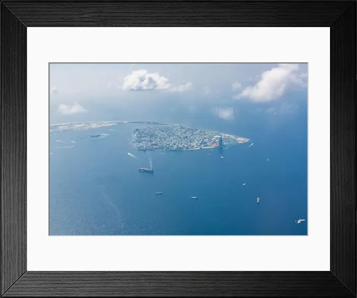 Framed Print : Maldives island capital island, Male. Hulhumale city island view from over the clouds. Aerial landscape in exotic travel destination Framed Print : Maldives island capital island, Male. Hulhumale city island view from over the clouds. Aerial landscape in exotic travel destination