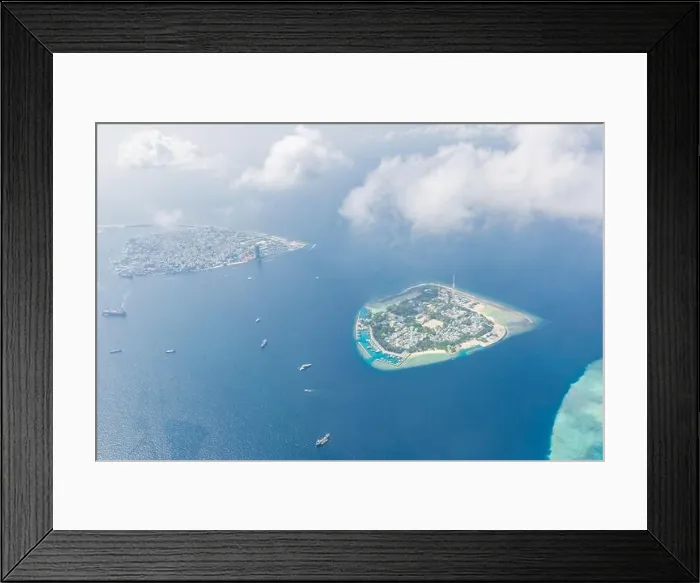 Framed Print : Maldives island capital island, Male. Hulhumale city island view from over the clouds. Aerial landscape in exotic travel destination Framed Print : Maldives island capital island, Male. Hulhumale city island view from over the clouds. Aerial landscape in exotic travel destination