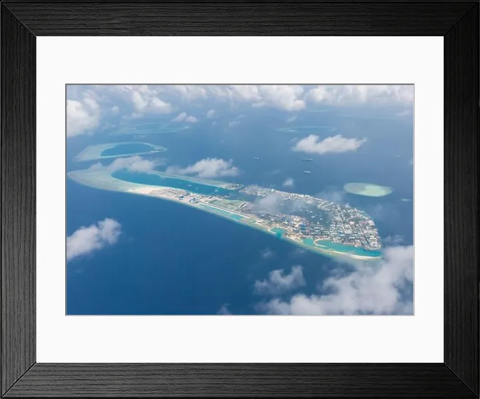 Framed Print : Maldives island capital island, Male. Hulhumale city island view from over the clouds. Aerial landscape in exotic travel destination Framed Print : Maldives island capital island, Male. Hulhumale city island view from over the clouds. Aerial landscape in exotic travel destination