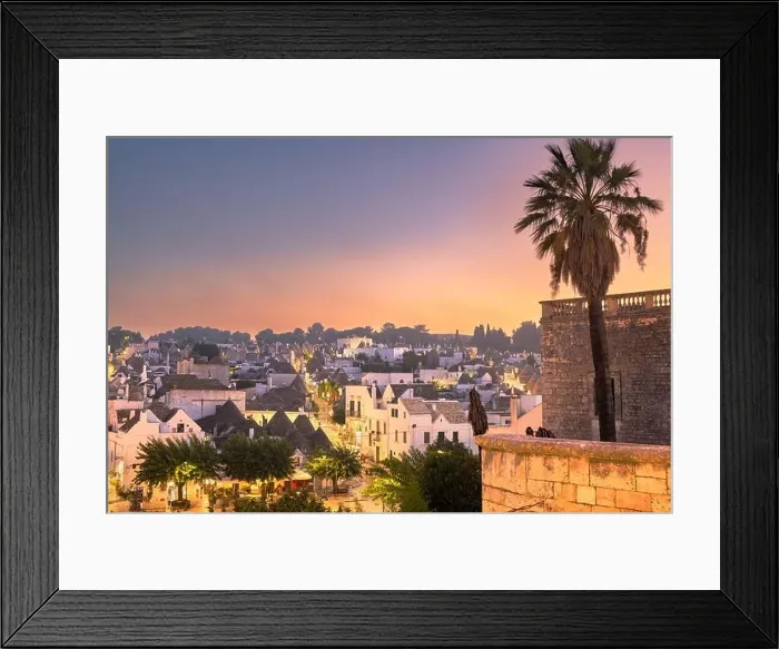 Framed Print : Alberobello, Italy with Trulli houses at dusk Framed Print : Alberobello, Italy with Trulli houses at dusk
