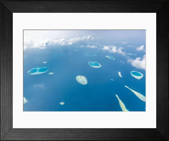 Framed Print : Aerial view of Maldives atolls is the world top beauty. Maldives tourism. Indian ocean with Maldivian island, aerial photography Framed Print : Aerial view of Maldives atolls is the world top beauty. Maldives tourism. Indian ocean with Maldivian island, aerial photography