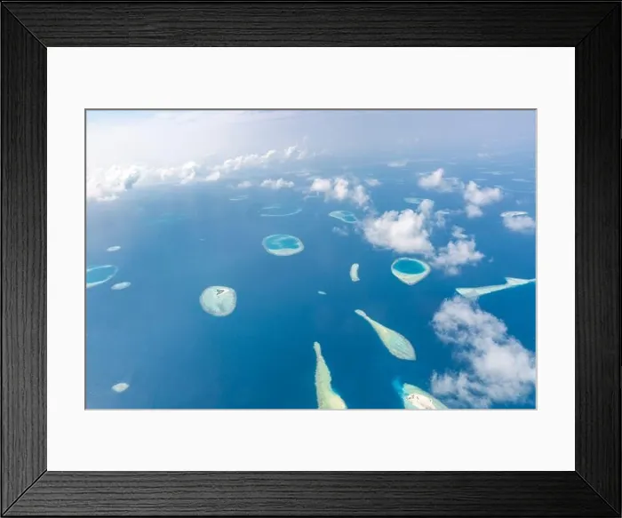 Framed Print : Aerial view of Maldives atolls is the world top beauty. Maldives tourism. Indian ocean with Maldivian island, aerial photography Framed Print : Aerial view of Maldives atolls is the world top beauty. Maldives tourism. Indian ocean with Maldivian island, aerial photography