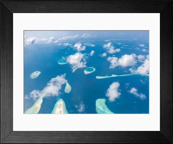 Framed Print : Aerial view of Maldives atolls is the world top beauty. Maldives tourism. Indian ocean with Maldivian island, aerial photography Framed Print : Aerial view of Maldives atolls is the world top beauty. Maldives tourism. Indian ocean with Maldivian island, aerial photography