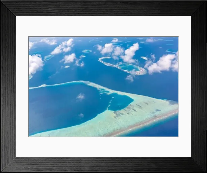 Framed Print : Aerial view of Maldives atolls is the world top beauty. Maldives tourism. Indian ocean with Maldivian island, aerial photography Framed Print : Aerial view of Maldives atolls is the world top beauty. Maldives tourism. Indian ocean with Maldivian island, aerial photography