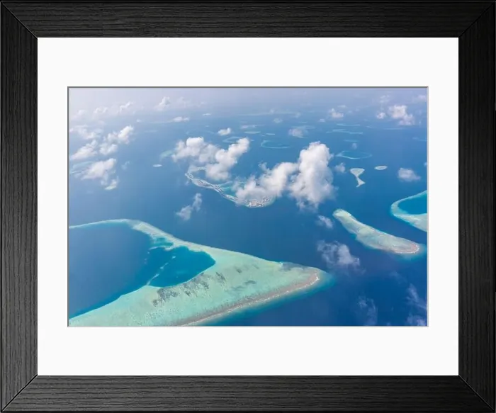 Framed Print : Aerial view of Maldives atolls is the world top beauty. Maldives tourism. Indian ocean with Maldivian island, aerial photography Framed Print : Aerial view of Maldives atolls is the world top beauty. Maldives tourism. Indian ocean with Maldivian island, aerial photography