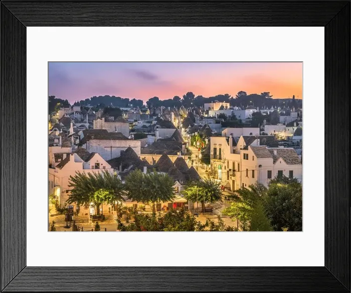 Framed Print : Alberobello, Italy with Trulli houses at dusk Framed Print : Alberobello, Italy with Trulli houses at dusk