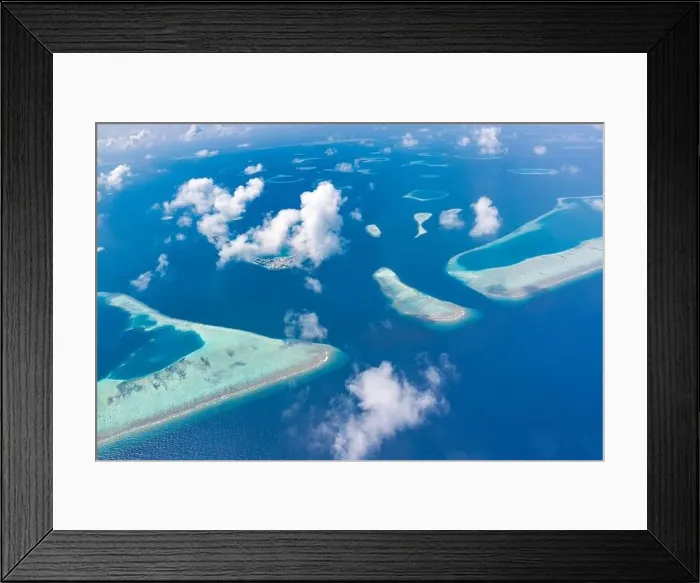 Framed Print : Aerial view of Maldives atolls is the world top beauty. Maldives tourism. Indian ocean with Maldivian island, aerial photography Framed Print : Aerial view of Maldives atolls is the world top beauty. Maldives tourism. Indian ocean with Maldivian island, aerial photography