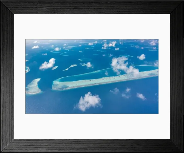 Framed Print : Aerial view of Maldives atolls is the world top beauty. Maldives tourism. Indian ocean with Maldivian island, aerial photography Framed Print : Aerial view of Maldives atolls is the world top beauty. Maldives tourism. Indian ocean with Maldivian island, aerial photography