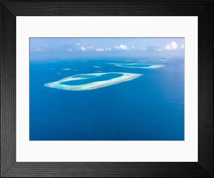 Framed Print : Aerial view of Maldives atolls is the world top beauty. Maldives tourism. Indian ocean with Maldivian island, aerial photography Framed Print : Aerial view of Maldives atolls is the world top beauty. Maldives tourism. Indian ocean with Maldivian island, aerial photography