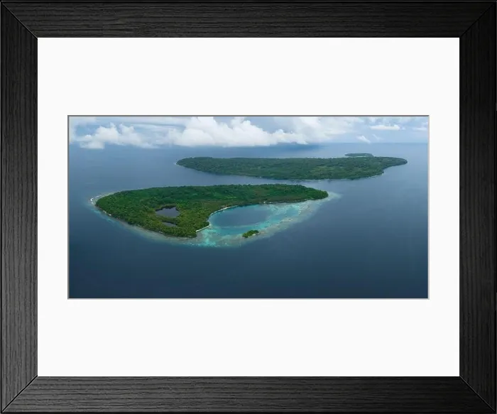 Framed Print : Tropical islands are fringed by coral reefs in the Solomon Islands. This beautiful South Pacific country is home to spectacular marine biodiversity Framed Print : Tropical islands are fringed by coral reefs in the Solomon Islands. This beautiful South Pacific country is home to spectacular marine biodiversity