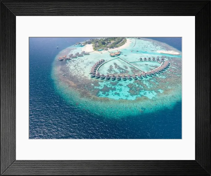 Framed Print : Perfect aerial landscape, luxury tropical resort or hotel with water villas and beautiful beach scenery. Amazing bird eyes view in Maldives, landscape Framed Print : Perfect aerial landscape, luxury tropical resort or hotel with water villas and beautiful beach scenery. Amazing bird eyes view in Maldives, landscape