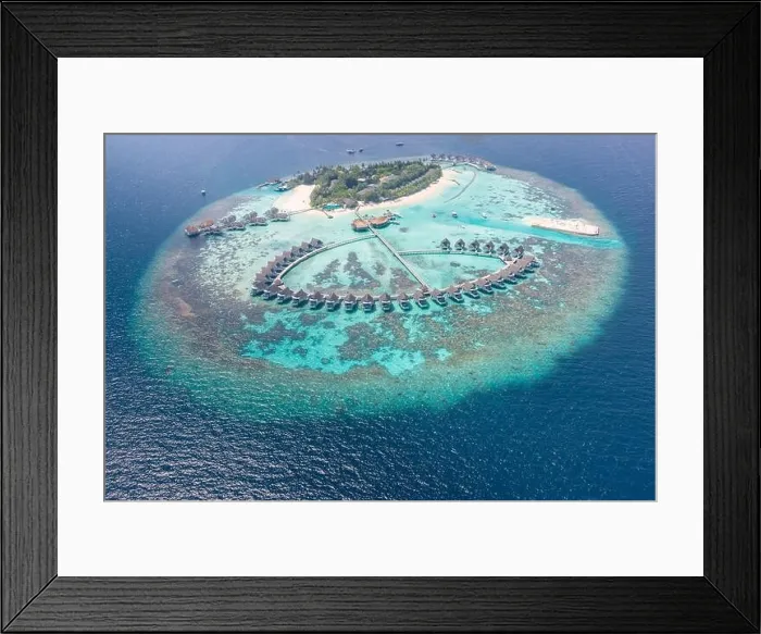 Framed Print : Perfect aerial landscape, luxury tropical resort or hotel with water villas and beautiful beach scenery. Amazing bird eyes view in Maldives, landscape Framed Print : Perfect aerial landscape, luxury tropical resort or hotel with water villas and beautiful beach scenery. Amazing bird eyes view in Maldives, landscape