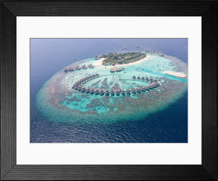 Framed Print : Perfect aerial landscape, luxury tropical resort or hotel with water villas and beautiful beach scenery. Amazing bird eyes view in Maldives, landscape Framed Print : Perfect aerial landscape, luxury tropical resort or hotel with water villas and beautiful beach scenery. Amazing bird eyes view in Maldives, landscape