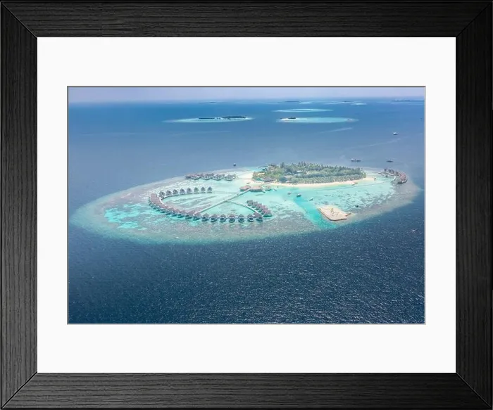 Framed Print : Perfect aerial landscape, luxury tropical resort or hotel with water villas and beautiful beach scenery. Amazing bird eyes view in Maldives, landscape Framed Print : Perfect aerial landscape, luxury tropical resort or hotel with water villas and beautiful beach scenery. Amazing bird eyes view in Maldives, landscape