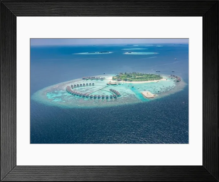 Framed Print : Perfect aerial landscape, luxury tropical resort or hotel with water villas and beautiful beach scenery. Amazing bird eyes view in Maldives, landscape