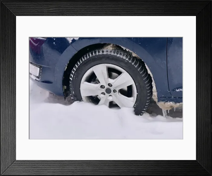 Framed Print : Car with winter tires on the snow covered road Framed Print : Car with winter tires on the snow covered road