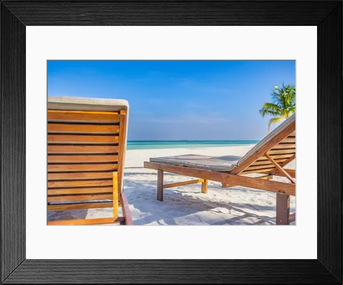 Framed Print : Beautiful beach. Couple chairs on the sandy beach near the sea, blurred island landscape exotic shore coast. Summer holiday and dream vacation concept Framed Print : Beautiful beach. Couple chairs on the sandy beach near the sea, blurred island landscape exotic shore coast. Summer holiday and dream vacation concept