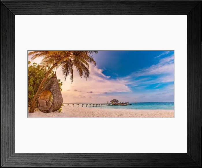 Framed Print : Romantic tropical sunset beach panorama as summer landscape with relax beach swing or hammock on coconut palm, white sand and calm sea beach banner Framed Print : Romantic tropical sunset beach panorama as summer landscape with relax beach swing or hammock on coconut palm, white sand and calm sea beach banner