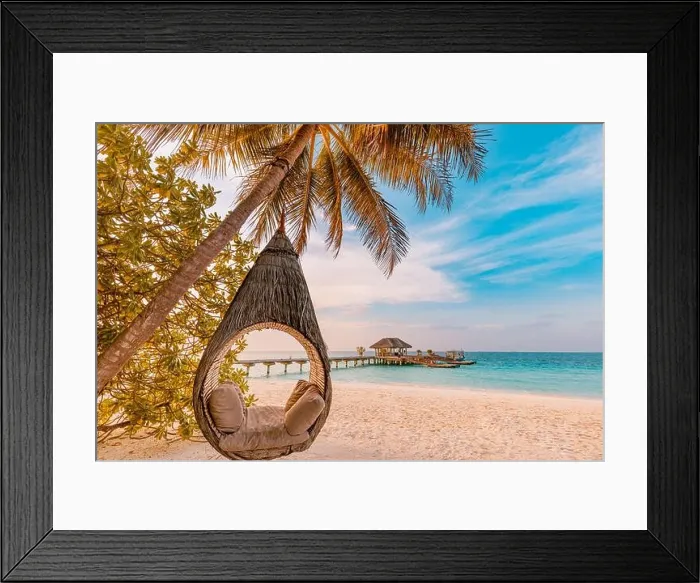 Framed Print : Tropical beach sunset as summer landscape with luxury resort beach palm swing hammock, sand seaside shore for sunset beach landscape. Tranquil beach Framed Print : Tropical beach sunset as summer landscape with luxury resort beach palm swing hammock, sand seaside shore for sunset beach landscape. Tranquil beach